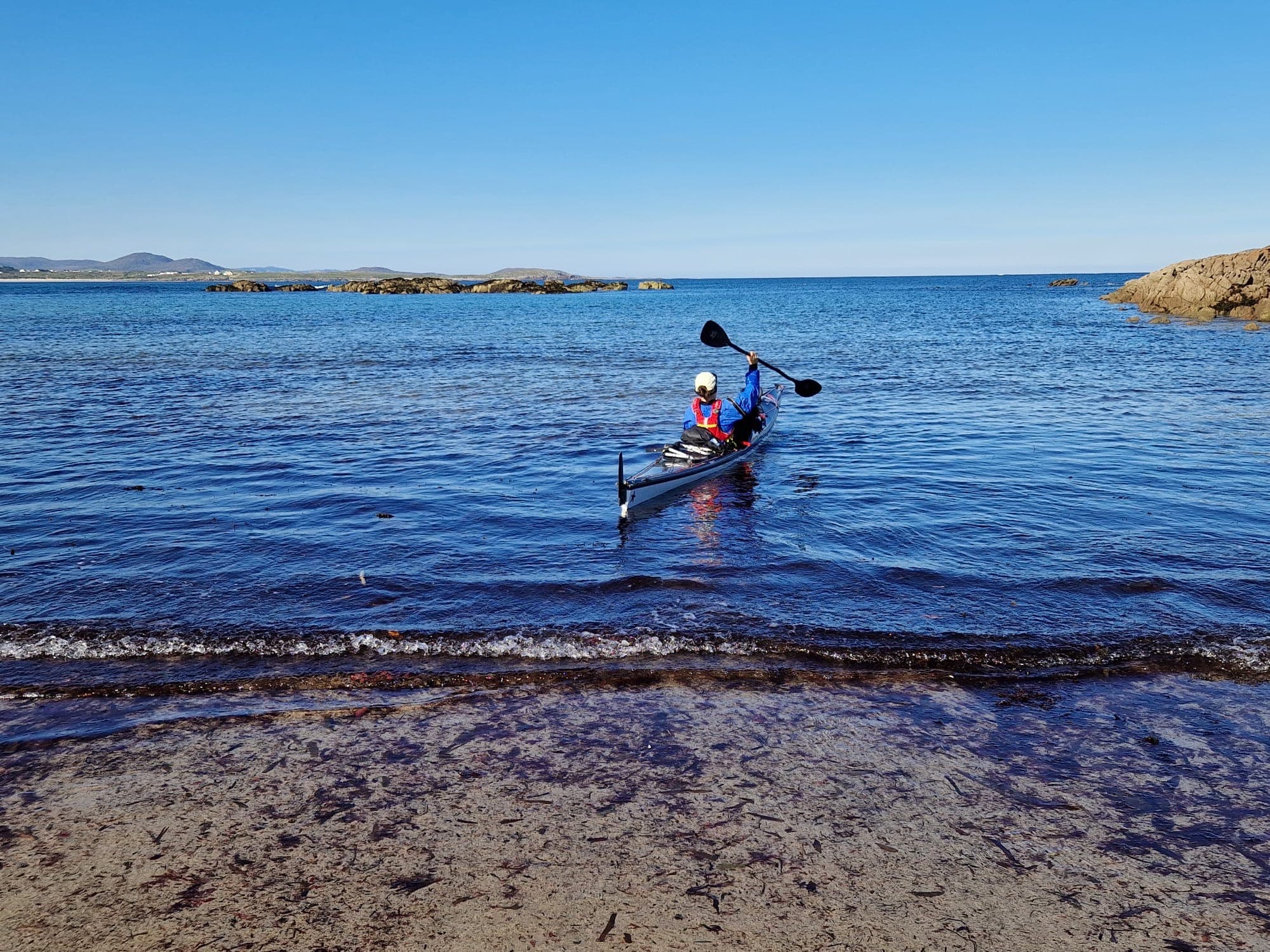 Ariel kayaking on the Irish coast